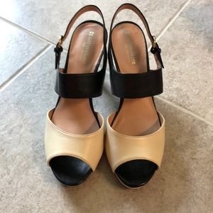 Black and ivory naturalized heels